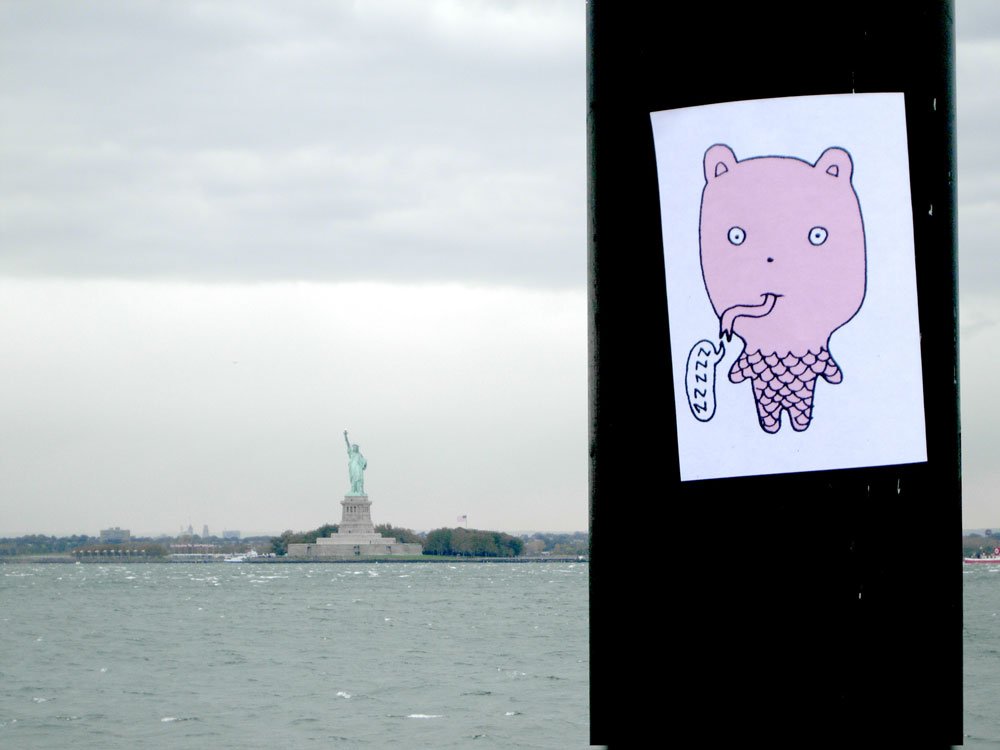 Teddy invasion, reptile-teddy visiting the statue of Liberty, NY